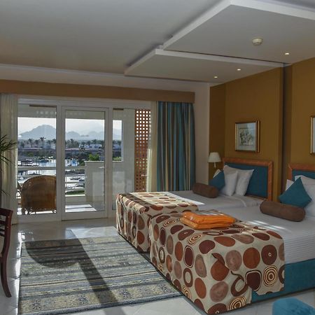 Pickalbatros Golf Beach Resort Sharm el-Sheik Eksteriør bilde A room at the Hilton Sharm El Sheikh